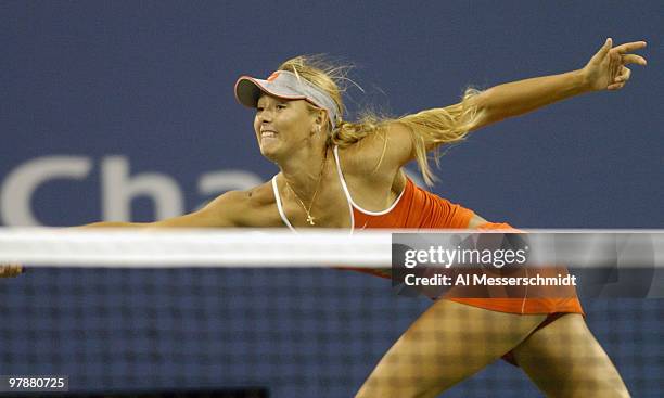 Maria Sharapova competes in a quarter final mixed doubles match September 6, 2004 at the 2004 US Open in New York. Sharapova and partner Max Mirnyi...