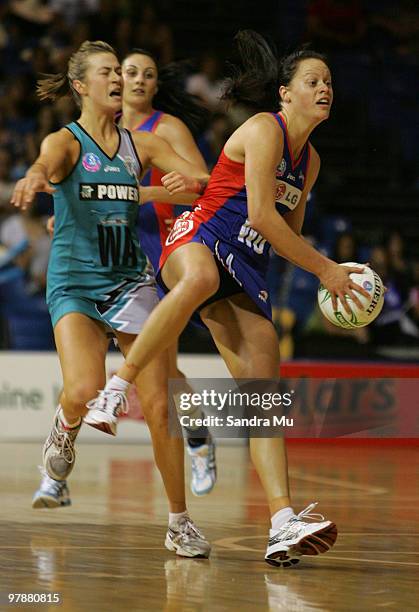 Larrissa Willcox of the Mystics intercepts the ball from Emily Beaton of the Thunderbirds during the round one ANZ Championships match between the...