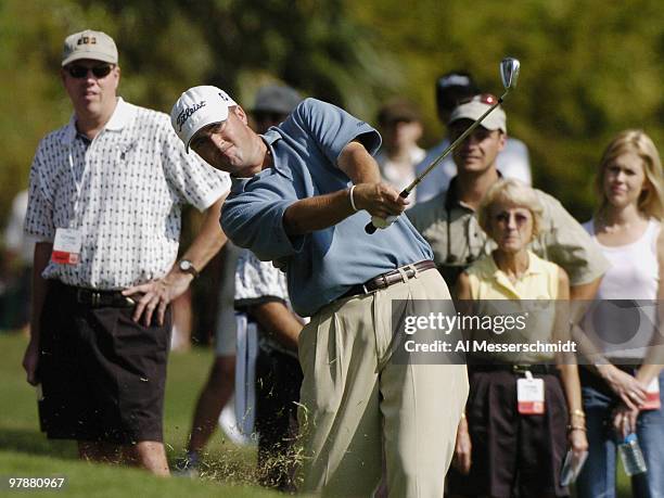 Ryan Palmer hits from the 10th fairway rough during fourth-round competition at the Funai Classic, October 24, 2004. Baird was tied for the lead with...