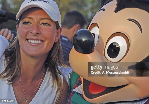 Tour rookie Ryan Palmer shoot s 22 under par and wins the Funai Classic at Walt Disney World Resort October 24, 2004 and his wif, Jennifer, enjoys a...