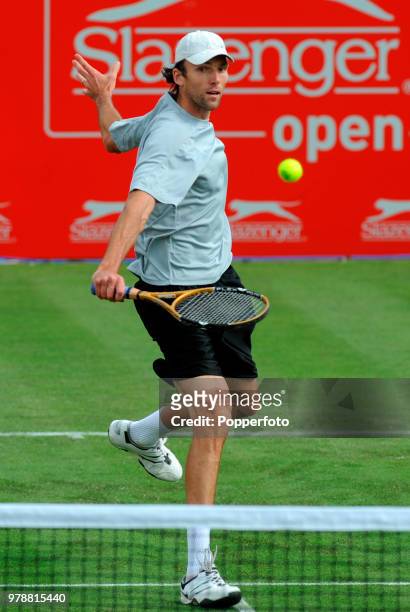 Ivo Karlovic of Croatia in action against Jonas Bjorkman of Sweden during their Singles First Round match in the Nottingham Open tennis tournament at...