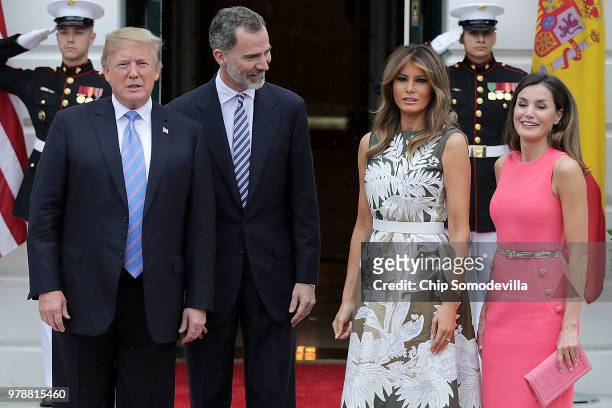 President Donald Trump, King Felipe VI of Spain, first lady Melania Trump and Queen Letizia of Spain pose for photographs outside the White House...