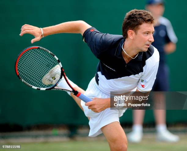 Alex Bogdanovic of Great Britain in action against Alejandro Falla of Colombia in a Singles qualifying match during the Nottingham Open tennis...