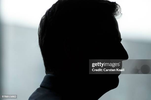 Former FBI Director James Comey talks backstage before a panel discussion about his book "A Higher Loyalty" on June 19, 2018 in Berlin, Germany....