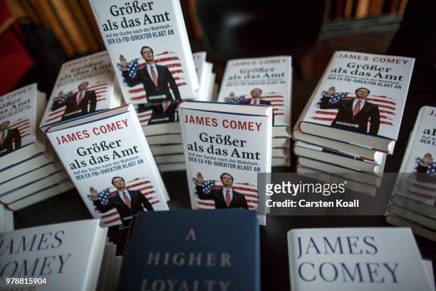 Exemplares of the book "A Higher Loyalty" of former FBI Director James Comey lies on a table before a panel discussion about his book "A Higher...