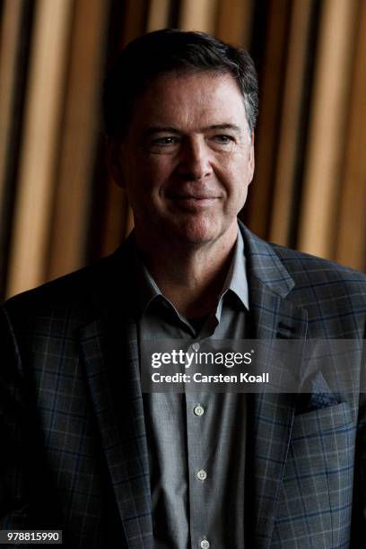 Former FBI Director James Comey talks backstage before a panel discussion about his book "A Higher Loyalty" on June 19, 2018 in Berlin, Germany....