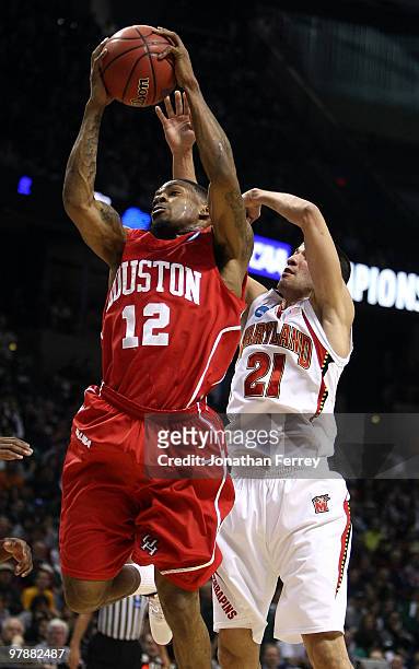 Aubrey Coleman of the Houston Cougars shoots the ball against Greivis Vasquez of the Maryland Terrapins during the first round of the 2010 NCAA men's...