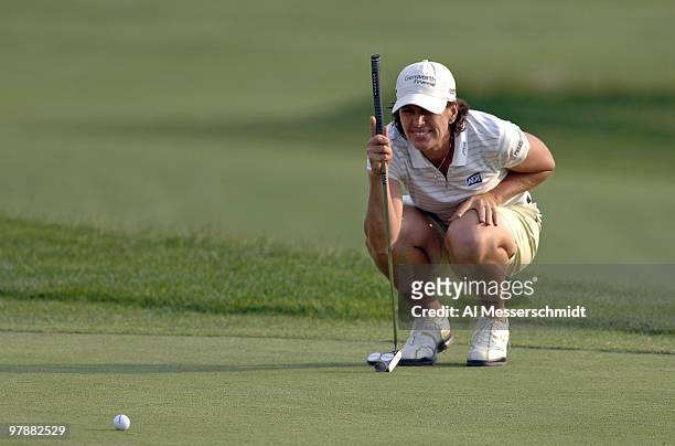 Julie Inkster studies a putt on the 18th green during the second round at Newport Country Club, site of the 2006 U. S. Women's Open in Newport, Rhode...