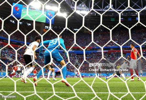 Ahmed Fathi of Egypt scores an own goal past team mate Mohamed Elshenawy to put Russia in front 1-0 during the 2018 FIFA World Cup Russia group A...