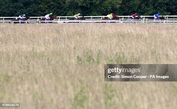 Victory command ridden by Joe Fanning leads the field during The Horse Comes First Novice Median Auction Stakes at Beverley Racecourse.