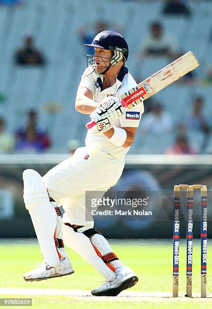Cameron White of Victoria plays a hook shot during day four of the Sheffield Shield Final between the Victorian Bushrangers and the Queensland Bulls...