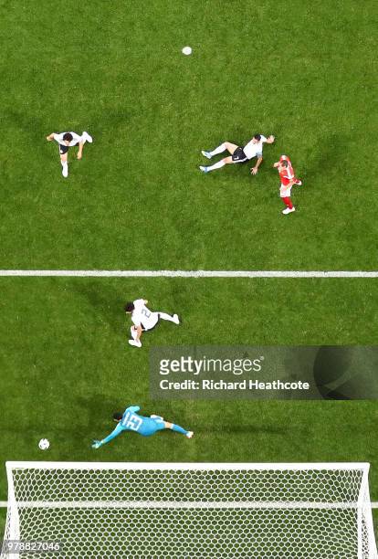 Ahmed Fathi of Egypt scores an own goal past Mohamed Elshenawy of Egypt, scoring Russia's first goal during the 2018 FIFA World Cup Russia group A...