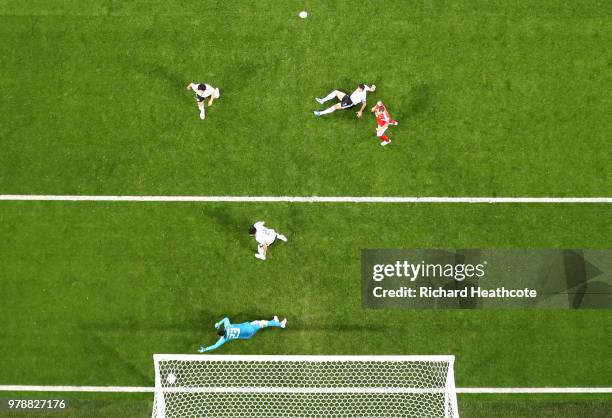 Ahmed Fathi of Egypt scores an own goal past Mohamed Elshenawy of Egypt, scoring Russia's first goal during the 2018 FIFA World Cup Russia group A...