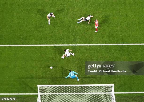 Ahmed Fathi of Egypt scores an own goal past Mohamed Elshenawy of Egypt, scoring Russia's first goal during the 2018 FIFA World Cup Russia group A...