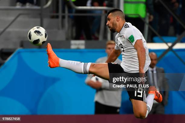 Egypt's midfielder Abdallah Said plays the ball during the Russia 2018 World Cup Group A football match between Russia and Egypt at the Saint...