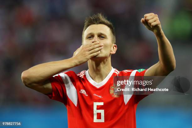 Denis Cheryshev of Russia celebrates after scoring his team's second goal during the 2018 FIFA World Cup Russia group A match between Russia and...