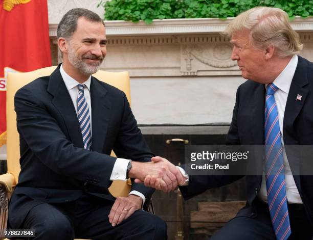 King Felipe VI of Spain and U.S. President Donald Trump shakes hands during a meeting at The White House on June 19, 2018 in Washington, DC.