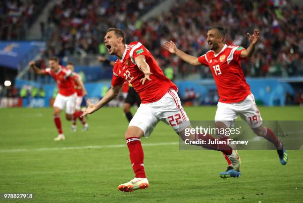 Artem Dzyuba of Russia celebrates after scoring his team's third goal during the 2018 FIFA World Cup Russia group A match between Russia and Egypt at...