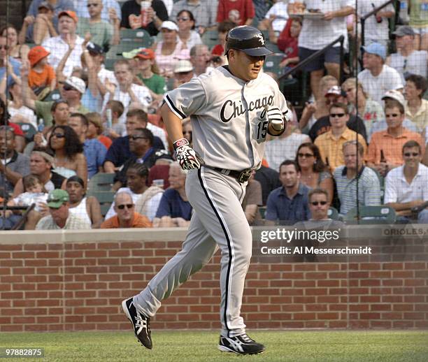 Chicago White Sox second baseman Tadahito Iguchi circles the bases after a home run against the Baltimore Orioles July 29, 2006 in Baltimore. The Sox...