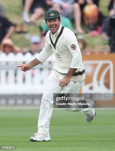 Ricky Ponting captain of Australia celebrates Ross Taylor of New Zealand being caught out during day two of the First Test match between New Zealand...