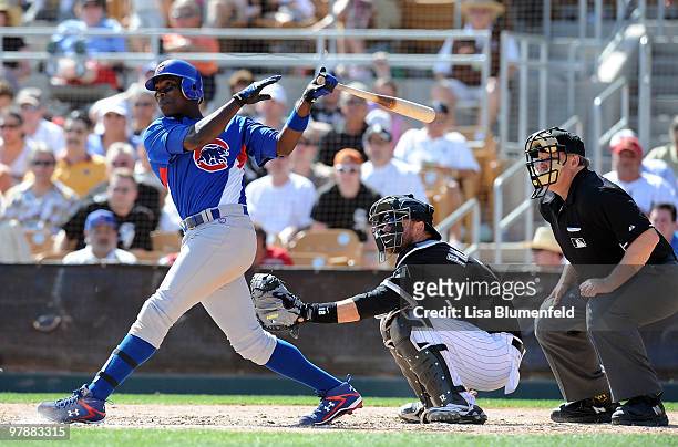 Alfonso Soriano of the Chicago Cubs bats during a spring training game against the Chicago White Sox on March 19, 2010 at The Ballpark at Camelback...