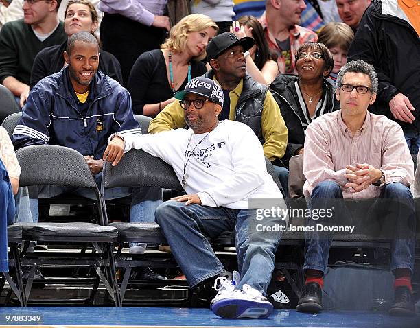 Charlie Ward, Spike Lee and John Turturro attend a game between the Philadelphia 76ers and the New York Knicks at Madison Square Garden on March 19,...