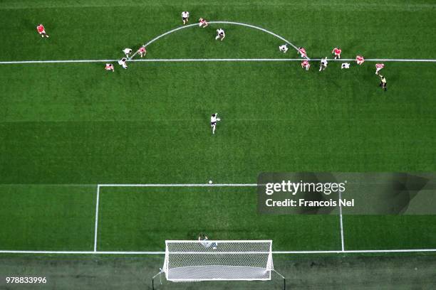 Mohamed Salah of Egypt scores his team's first goal from the penalty spot past Igor Akinfeev of Russia during the 2018 FIFA World Cup Russia group A...