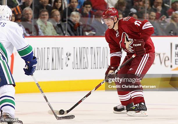 Radim Vrbata of the Phoenix Coyotes skates with the puck during the NHL game against the Vancouver Canucks at Jobing.com Arena on March 10, 2010 in...