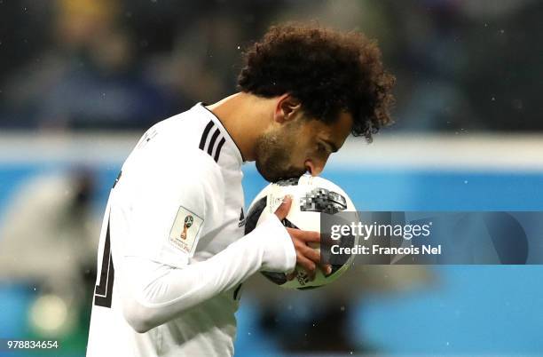 Mohamed Salah of Egypt kisses the ball before scoring from the penalty spot during the 2018 FIFA World Cup Russia group A match between Russia and...