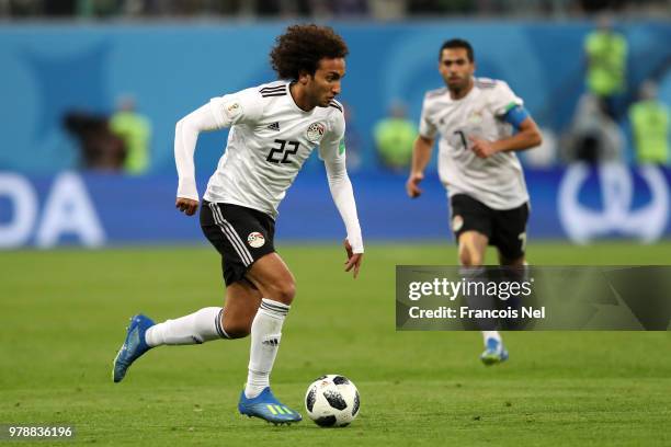 Amr Warda of Egypt runs with the ball during the 2018 FIFA World Cup Russia group A match between Russia and Egypt at Saint Petersburg Stadium on...