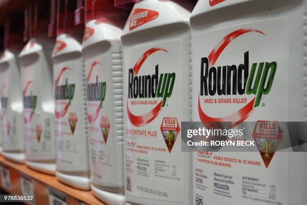 Bottles of Monsanto's Roundup are seen for sale June 19, 2018 at a retail store in Glendale, California. A former groundskeeper who contracted...