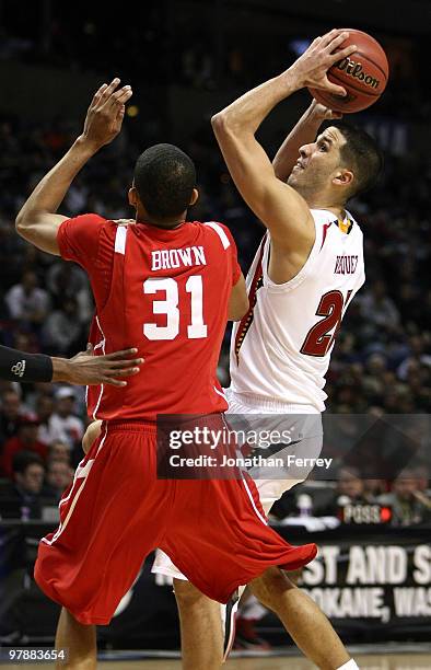 Greivis Vasquez of the Maryland Terrapins looks to shoot against Adam Brown of the Houston Cougars during the first round of the 2010 NCAA menÕs...