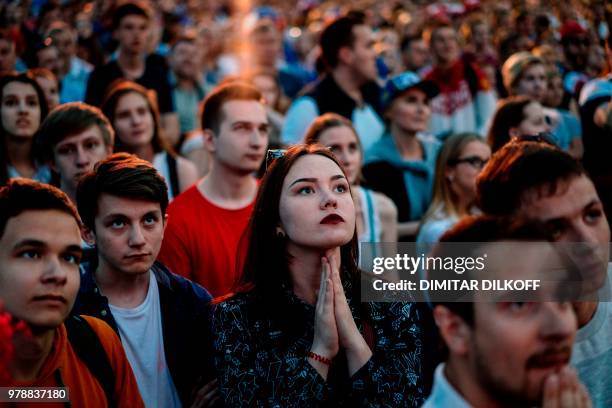 Russian fans watch their team during the Russia 2018 World Cup Group A football match between Russia and Egypt, at the Fan Zone in Nizhny Novgorod on...