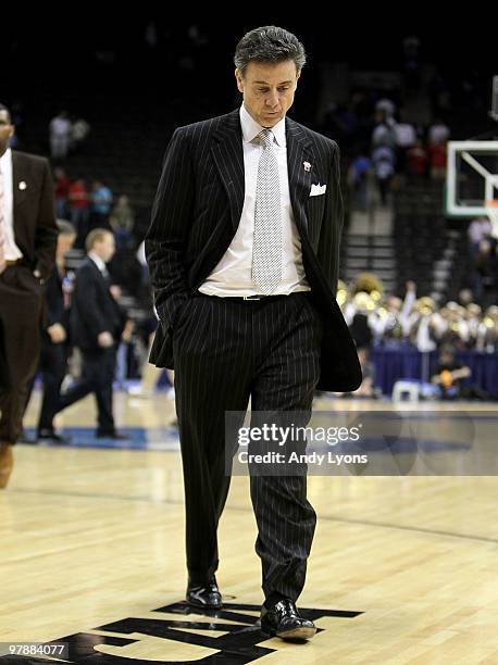 Rick Pitino the Head Coach of the Louisville Cardinals walks off of the court following the game against the California Golden Bears during the first...