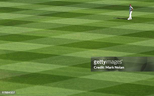 Queensland fielder waits in the outfield during day four of the Sheffield Shield Final between the Victorian Bushrangers and the Queensland Bulls at...