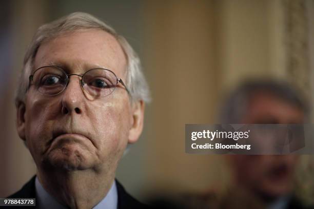 Senate Majority Leader Mitch McConnell, a Republican from Kentucky, listens during a news conference ahead of a Senate weekly luncheon meeting at the...