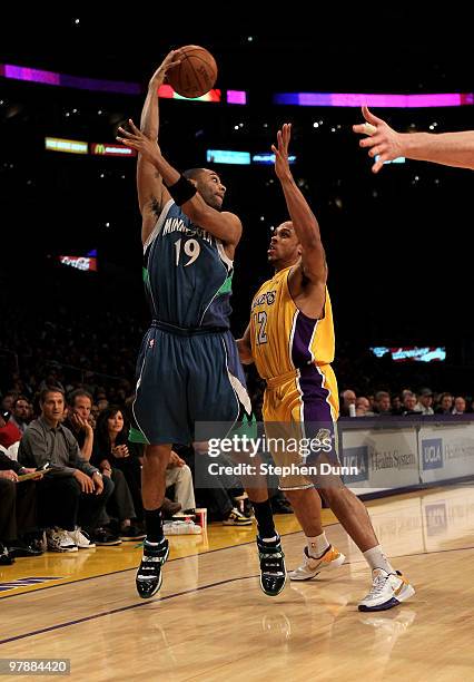 Wayne Ellington of the Minnesota Timberwolves throws a pass ove Shannon Brown of the Los Angeles Lakers on March 19, 2010 at Staples Center in Los...