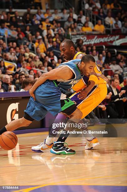 Wayne Ellington of the Minnesota Timberwolves loses the ball against Kobe Bryant of the Los Angeles Lakers at Staples Center on March 19, 2010 in Los...