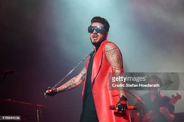 Singer Adam Lambert performs with Queen live on stage during a concert at Mercedes-Benz Arena on June 19, 2018 in Berlin, Germany.