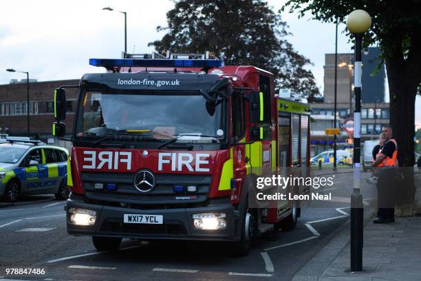 Members of the emergency services work around the entrance to Southgate underground station following reports of an explosion on June 19, 2018 in...