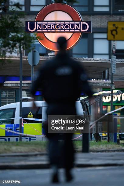 Members of the emergency services work around the entrance to Southgate underground station following reports of an explosion on June 19, 2018 in...