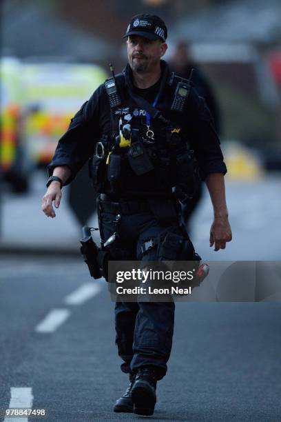 Members of the emergency services work around the entrance to Southgate underground station following reports of an explosion on June 19, 2018 in...