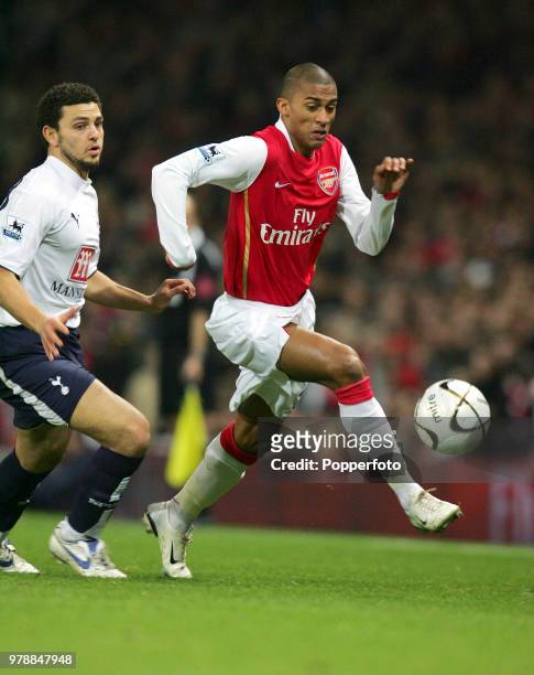 Armand Traore of Arsenal and Hossam Ghaly of Tottenham Hotspur in action during the Carling Cup Semi Final 2nd Leg match between Arsenal and...