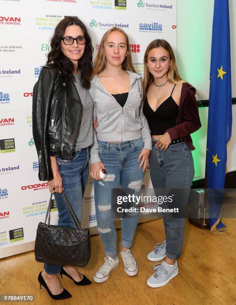 Courtney Cox, guest, and Coco Arquette attends "An Evening With Dermot O'Leary Presents...Ed Sheeran At The London Irish Centre" on June 19, 2018 in...