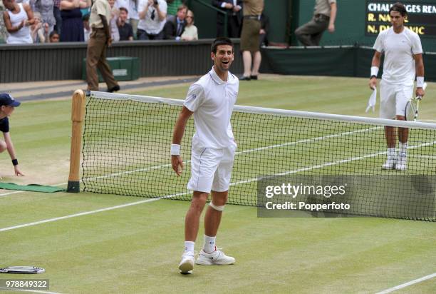 Novak Djokovic of Serbia celebrates after winning the men's singles final by defeating Rafael Nadal of Spain on Day 13 of the Wimbledon Lawn Tennis...