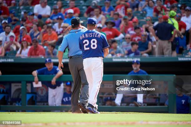 Rear view of Texas Rangers manager Jeff Banister being ejected by umpire Sam Holbrook from game vs Houston Astros at Globe Life Park in Arlington....