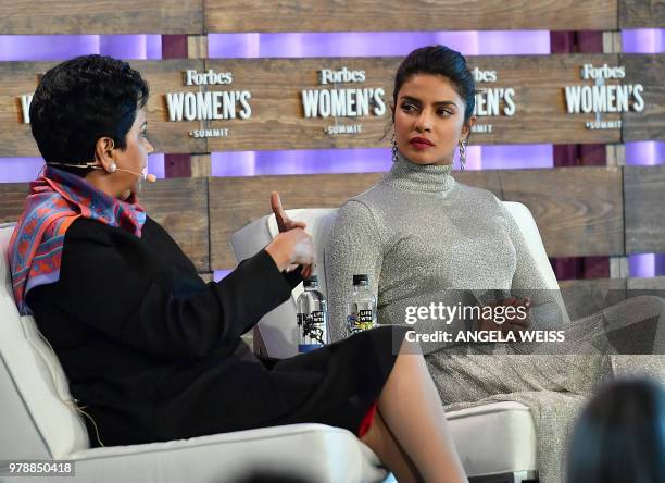 Indra Nooyi, chairman & chief executive officer, PepsiCo and Priyanka Chopra, actress, producer & activist speak onstage at the 2018 Forbes Women's...