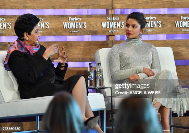 Indra Nooyi, chairman & chief executive officer, PepsiCo and Priyanka Chopra, actress, producer & activist speak onstage at the 2018 Forbes Women's...