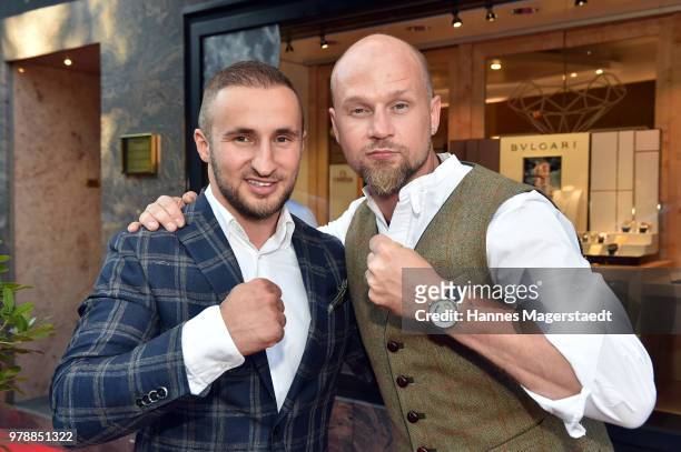 Dardan Morina and Kai Thiess attend the launch event for watchmaking company NOMOS Glashuette at Juweler Hilscher on June 19, 2018 in Munich, Germany.