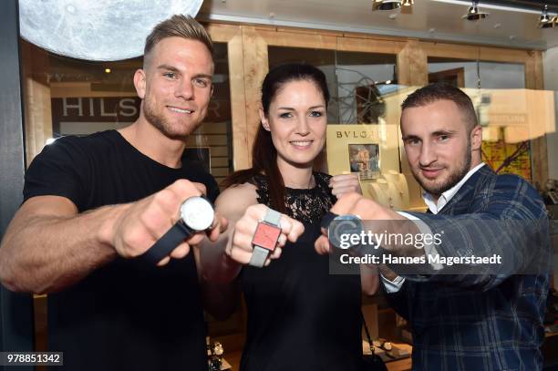 Sebastian Preuss, Marie Lang and Dardan Morina attend the launch event for watchmaking company NOMOS Glashuette at Juweler Hilscher on June 19, 2018...